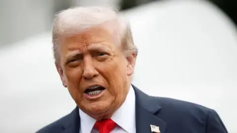 President Trump Confronts Australian Reporter Concerning Financial Transactions During Presidency